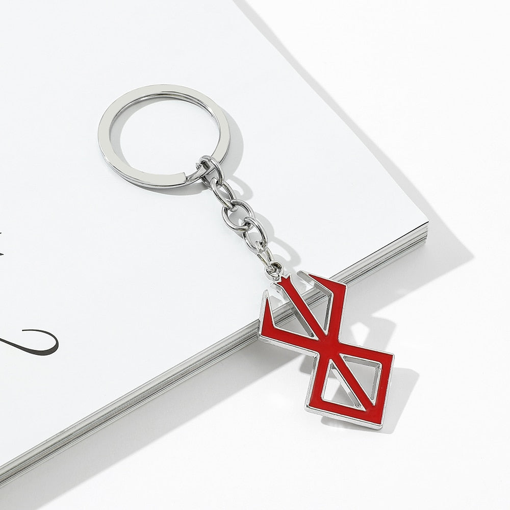 Chaveiro e Colar Marca do Sacrifício, Berserk